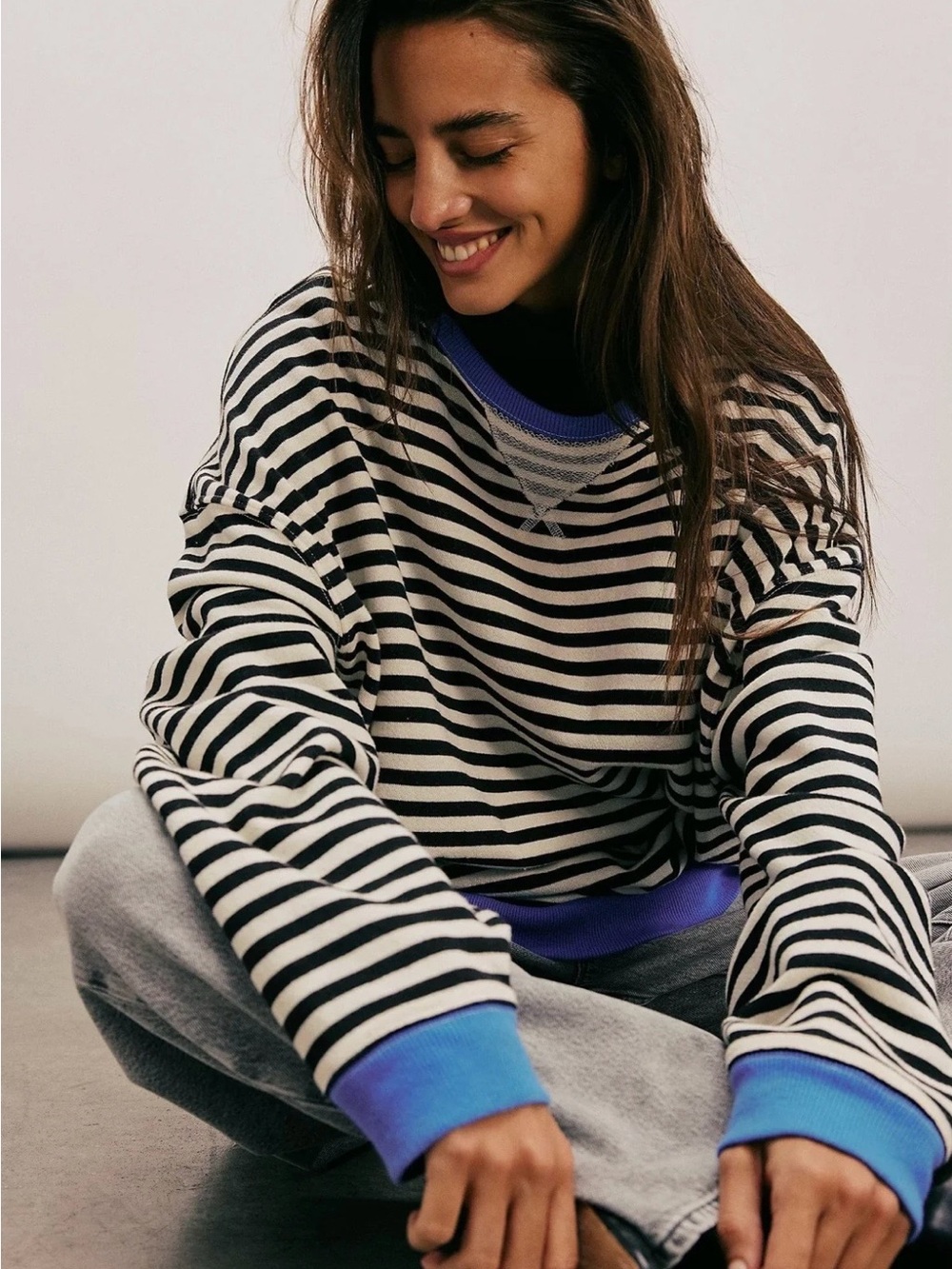 We The Free Black & White Striped Sweater with Bright Blue Trim